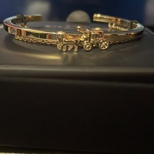 Coach gold horse and carriage bangle with chain